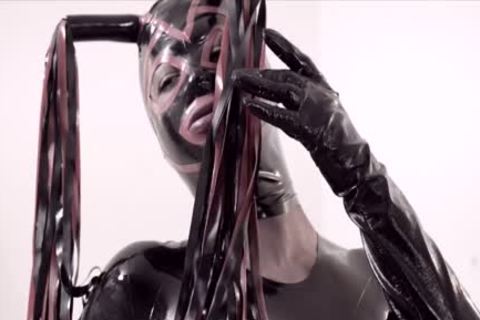 Fetish shemale In Latex Suit And Mask bonks