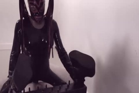 Fetish shemale In Latex Suit And Mask bangs