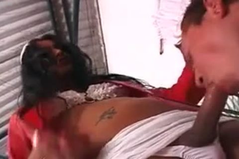 ebony TS Nurse receives sucked