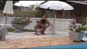 blonde TS receives Laid Poolside